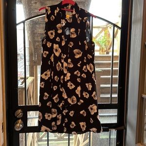 Like new, black dress with white poppies